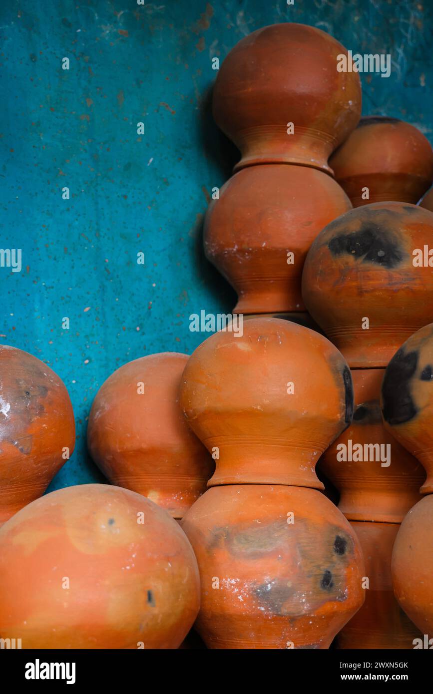 pots are gathered and arranged in a pattern in the empty space. The