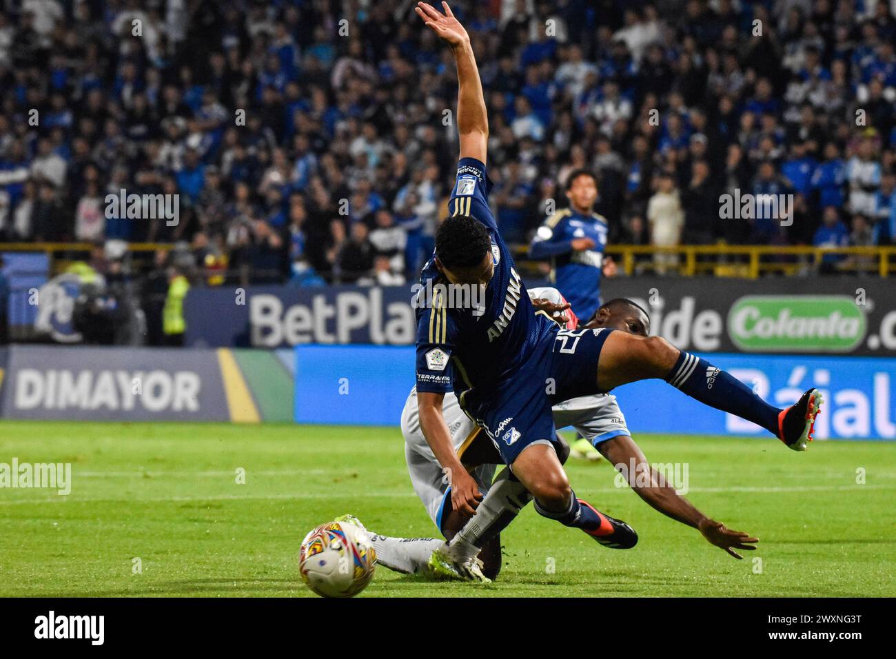 Bogota, Colombia. 30th Mar, 2024. Millonarios Stiven Vega fights a ball during the BetPlay DIMAYOR league match between Millonarios (2) and Fortaleza (1) in Bogota, Colombia, March 30, 2024. Photo by: Cristian Bayona/Long Visual Press Credit: Long Visual Press/Alamy Live News Stock Photo