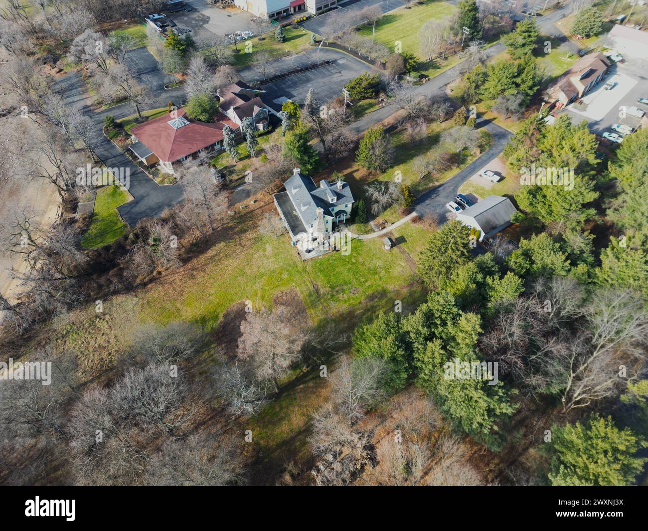 An aerial view of a residential area with lush trees Stock Photo - Alamy