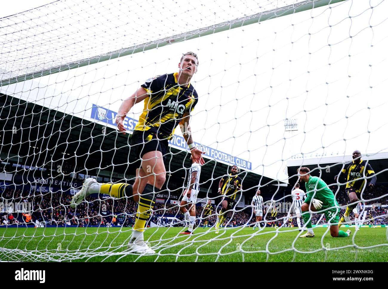 Watford's Mileta Rajovic celebrates scoring their side's second goal of the game during the Sky Bet Championship match at The Hawthorns, West Bromwich. Picture date: Monday April 1, 2024. Stock Photo