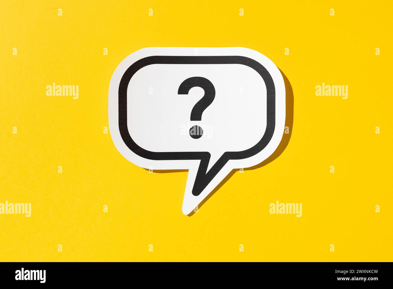 Question mark on speech bubble isolated on yellow background. Doubt, confusion, uncertainty concept Stock Photo