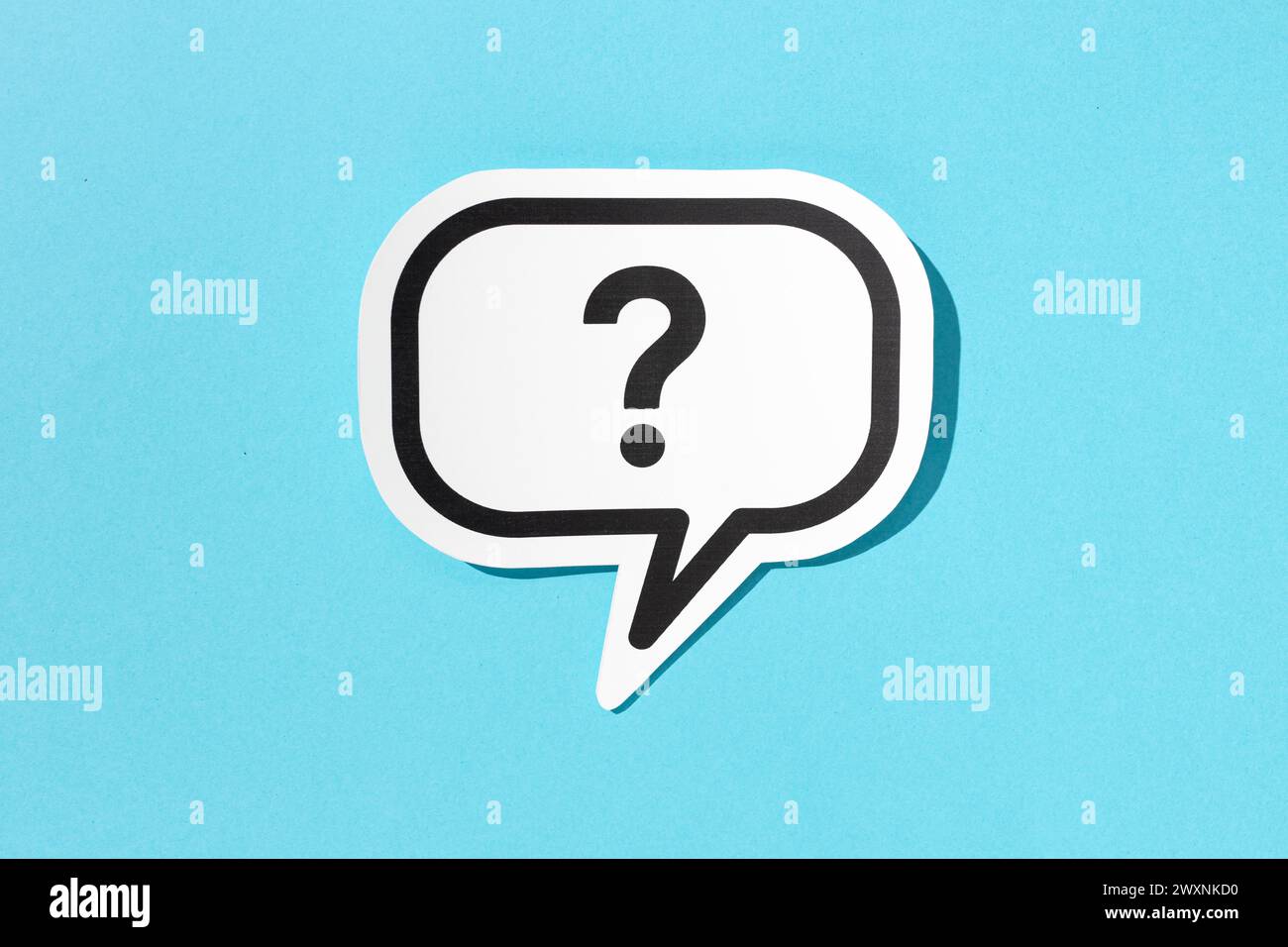 Question mark on speech bubble isolated on blue background. Doubt, confusion, uncertainty concept Stock Photo