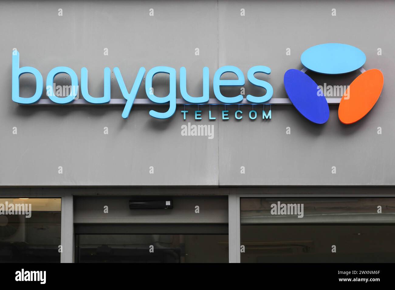 Voiron, France - June 1, 2018: Bouygues Telecom logo on wall of a store. Bouygues Telecom is a French mobile phone and Internet provider company Stock Photo