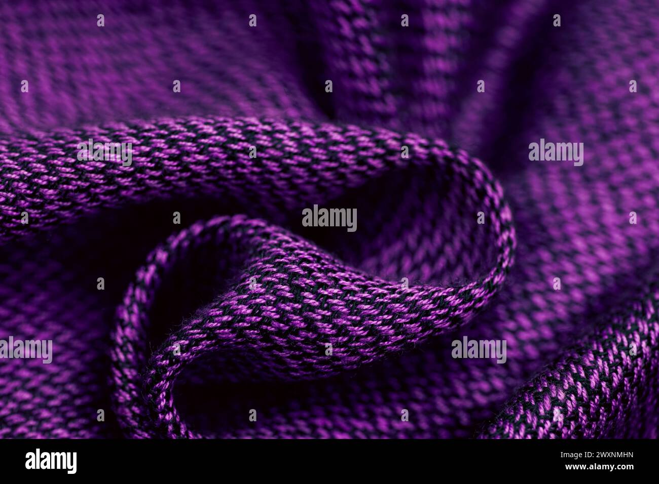 A purple fabric with textured thread and loop Stock Photo