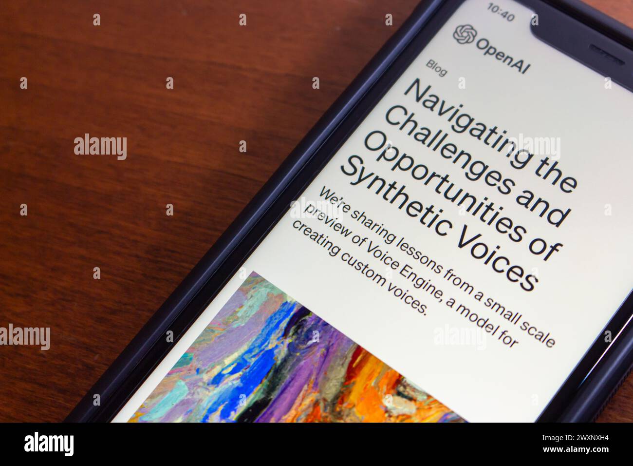 “Navigating the Challenges and Opportunities of Synthetic Voices” seen in iPhone. Voice Engine is text-to-speech AI model for synthetic voices OpenAI Stock Photo