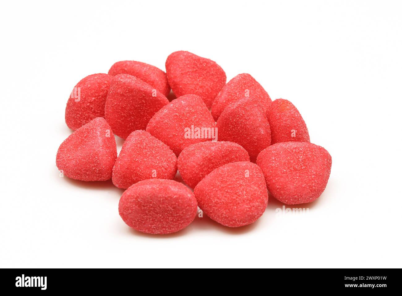 Pile of red gummy candies treat isolated on white background Stock Photo