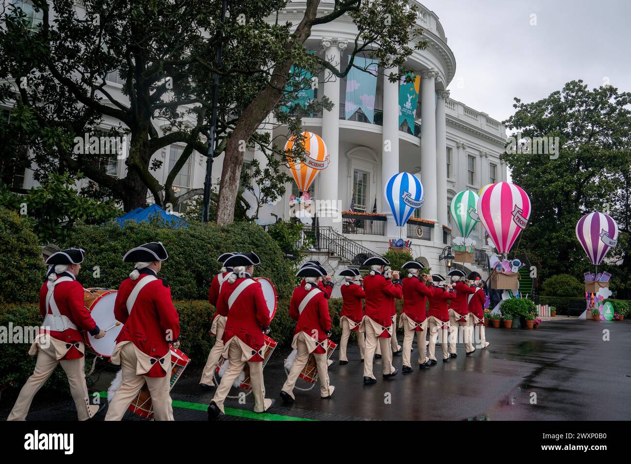 Washington, USA. 01st Apr, 2024. Members of the United States Army Old Guard Fife and Drum Corps arrive during the White House Easter Egg Roll on the South Lawn of the White House in Washington, DC, Monday, April. 1, 2024.(Photo by Nathan Howard/Sipa USA) Credit: Sipa USA/Alamy Live News Stock Photo