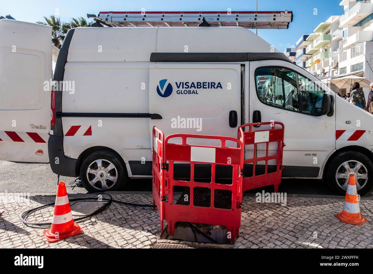 A Visabeira Global van is stationed on a telecommunications installation in Quarteira, Portugal. Stock Photo