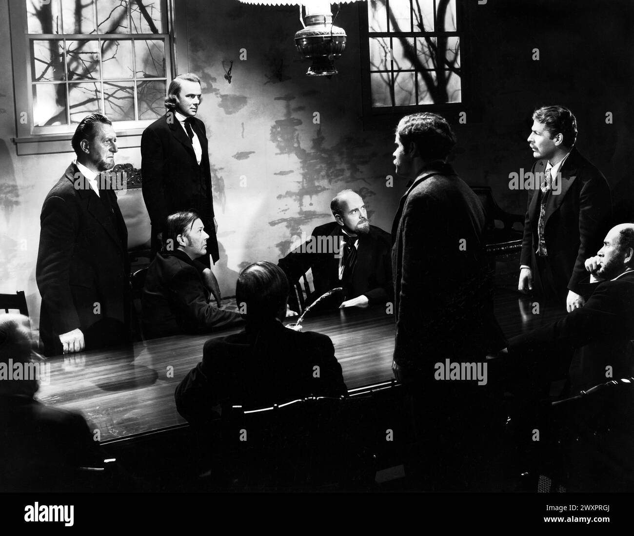 Dean Jagger (standing, 2nd left), Brian Donlevy (standing, far right