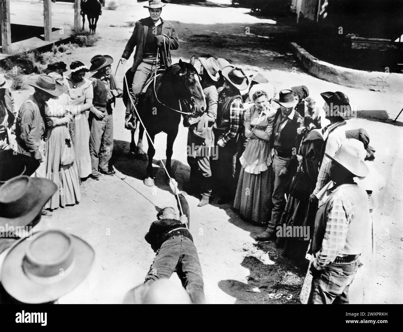 Joel McCrea (on horse), on-set of the film, 