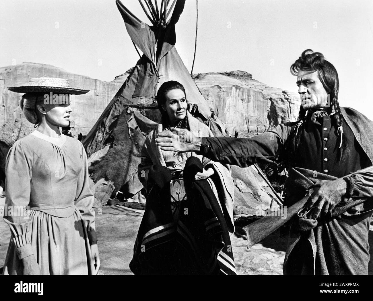Carroll Baker, Dolores Del Rio, Gilbert Roland, on-set of the film, 'Cheyenne Autumn', Warner Bros., 1964 Stock Photo