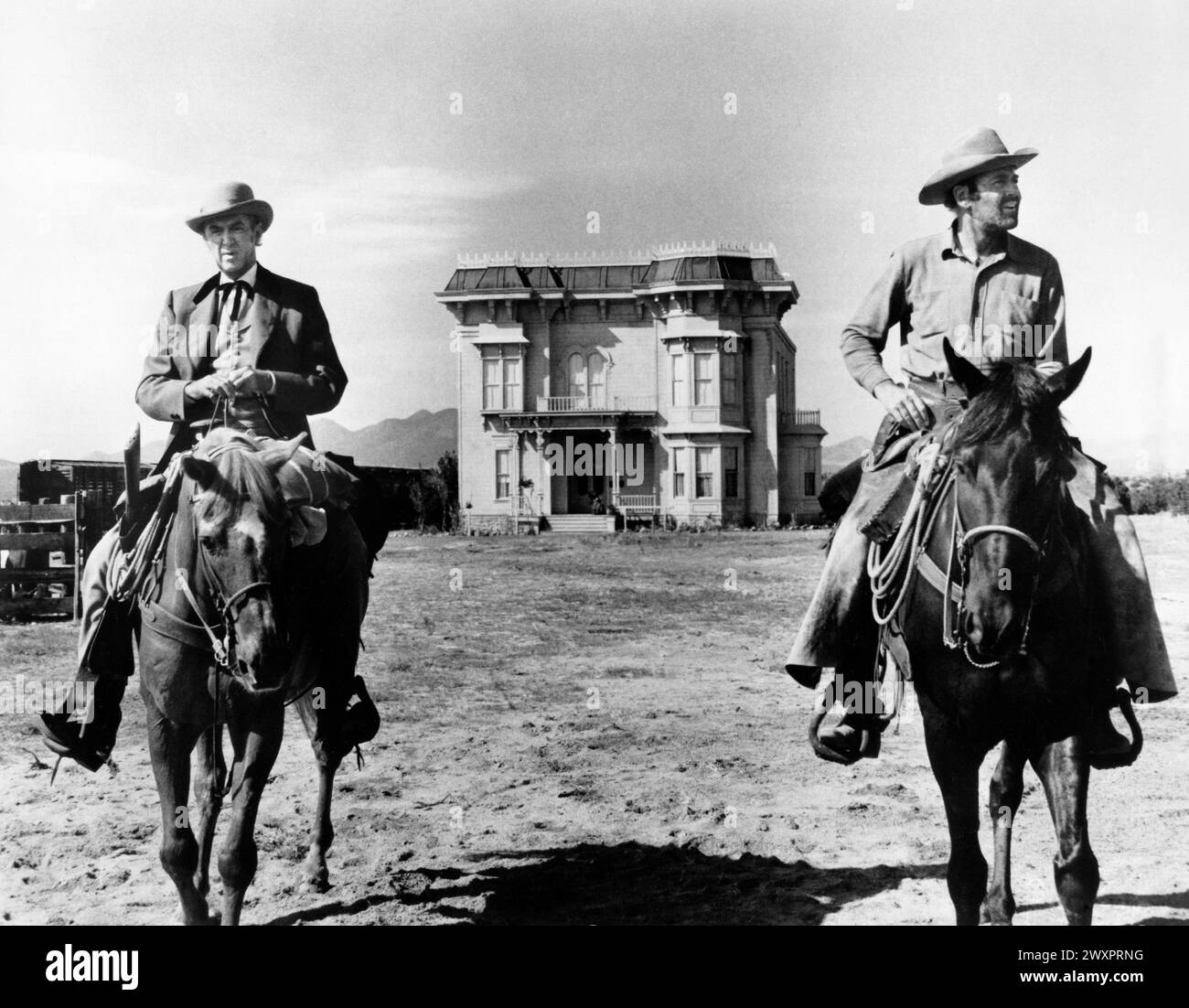 James Stewart, Henry Fonda, on-set of the film, 'The Cheyenne Social Club', National General Pictures, 1970 Stock Photo