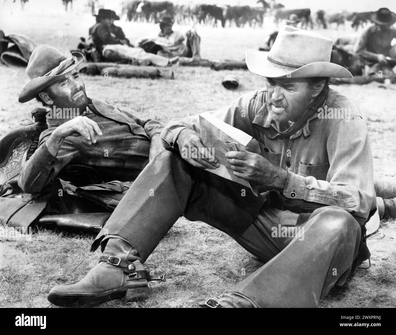 Henry Fonda, James Stewart, on-set of the film, 'The Cheyenne Social Club', National General Pictures, 1970 Stock Photo