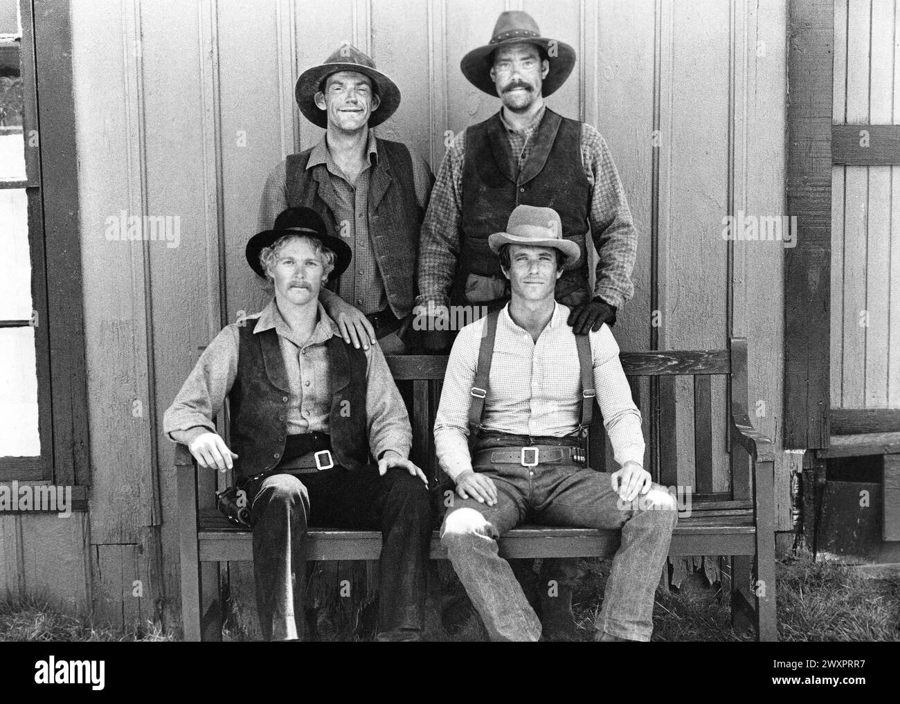 William Katt (bottom left), Tom Berenger (bottom right), Christopher Lloyd (top left), John Schuck (top right), on-set of the film, 'Butch And Sundance: The Early Days', 20th Century-Fox, 1979 Stock Photo