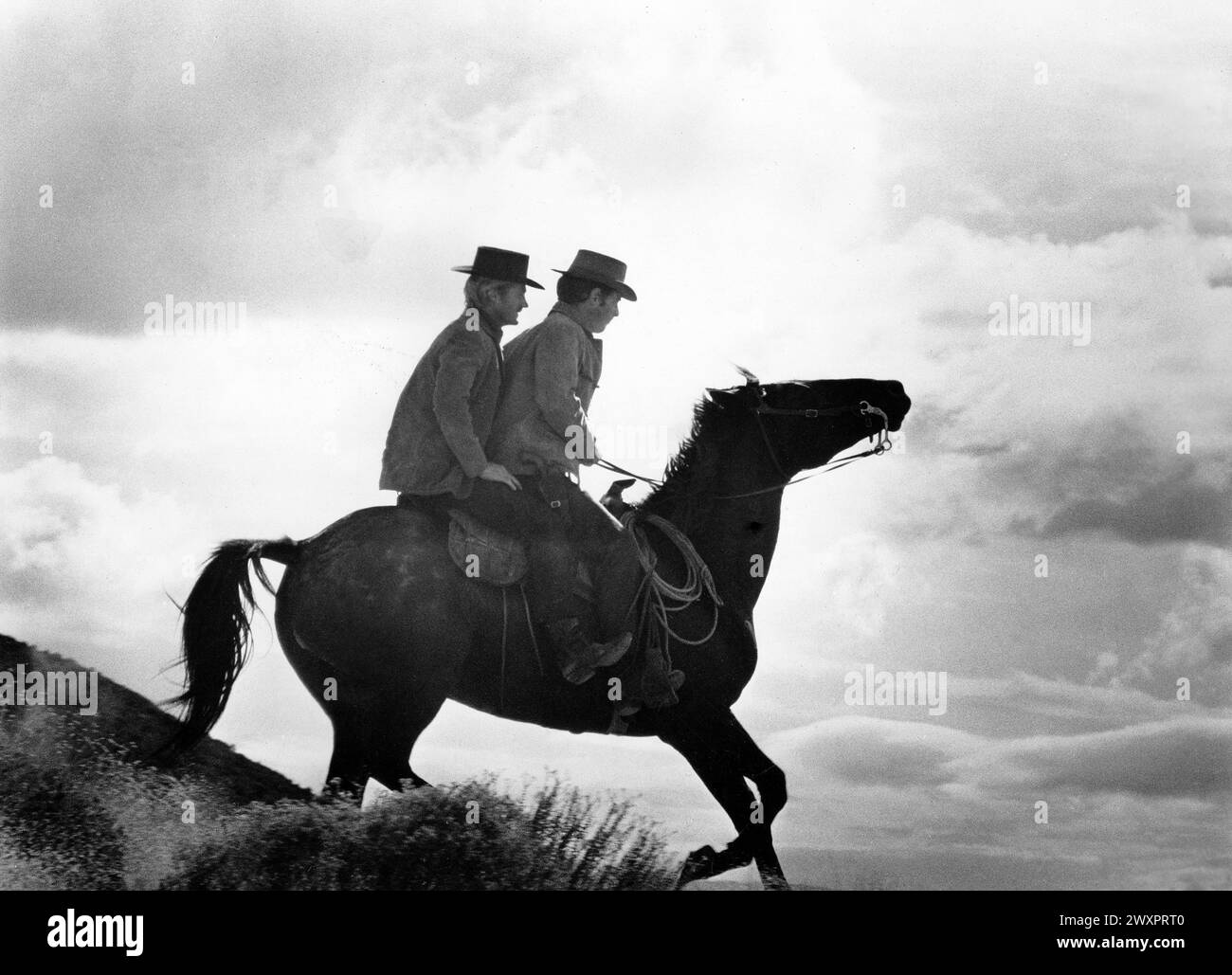 Two cowboys on horseback, on-set of the film, 'Butch Cassidy And The Sundance Kid', 20th Century-Fox, 1969 Stock Photo