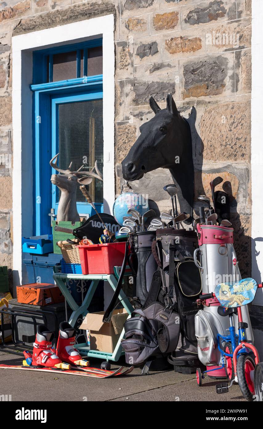 31 March 2024. Seafield Street,Cullen,Moray,Scotland. This is the pavement display of the Shop Cullen Collectibles. Showing a Horse Head, Golf Clubs, Stock Photo