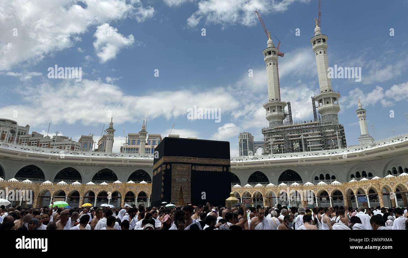 Mecca Saudi Arabia - Mar 28 2024: Al Kaaba in Al Haram mosque - Muslim pilgrims perform  hajj and umra in Makkah Stock Photo