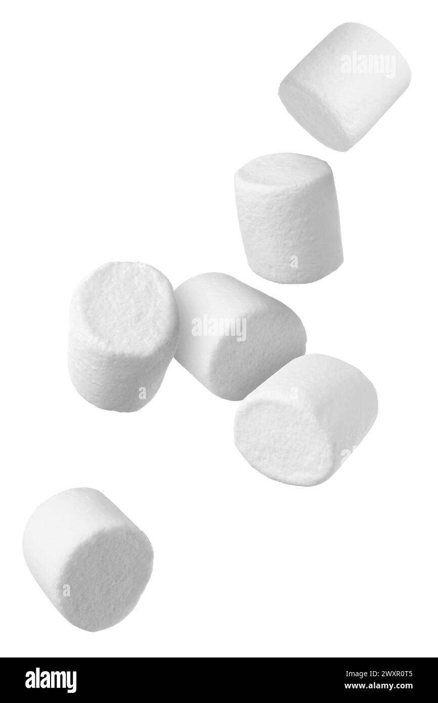 Many yummy marshmallows flying on white background Stock Photo - Alamy