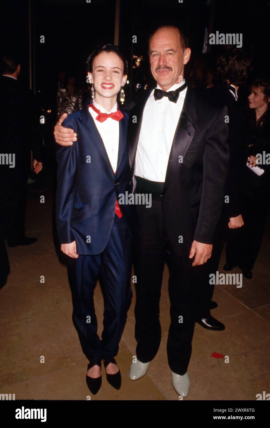 Juliette Lewis and father Geoffrey Lewis at the 49th Annual Golden Globe Awards on January 18, 1992 at the Beverly Hilton Hotel in Beverly Hills, California Credit: Ralph Dominguez/MediaPunch Stock Photo