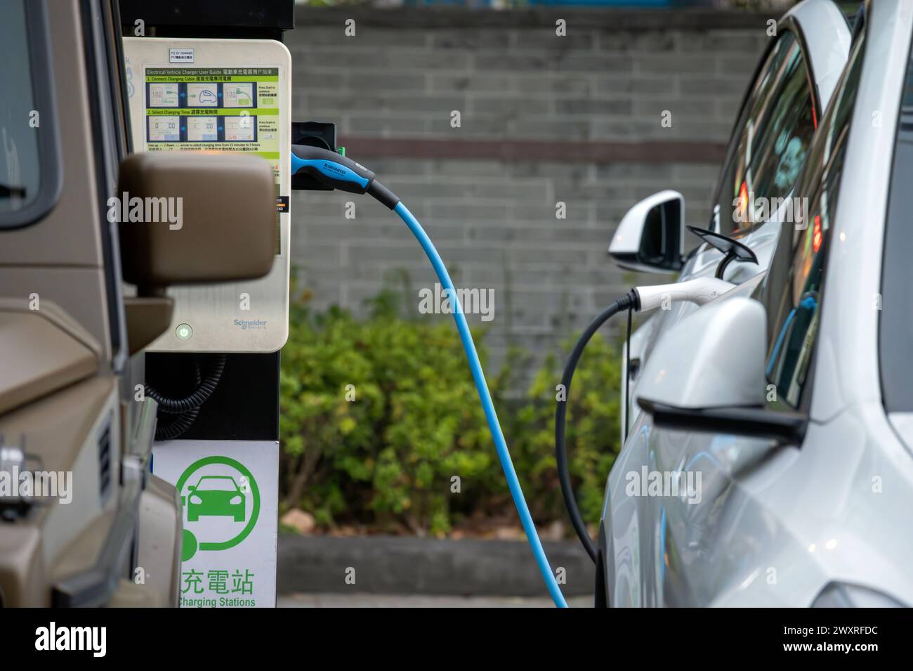 Electric Vehicle charging stations, Hong Kong, China. Stock Photo