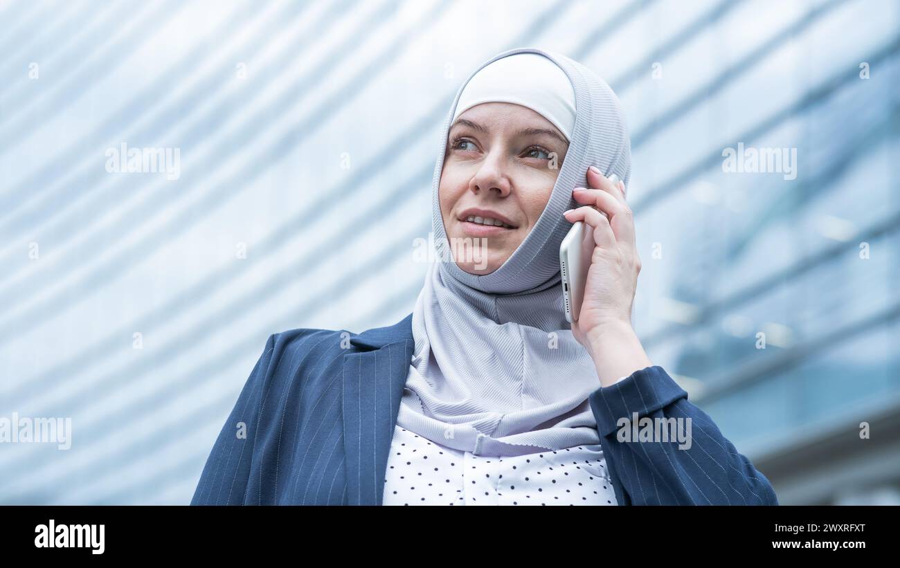Pretty woman in hijab walking hi-res stock photography and images - Alamy