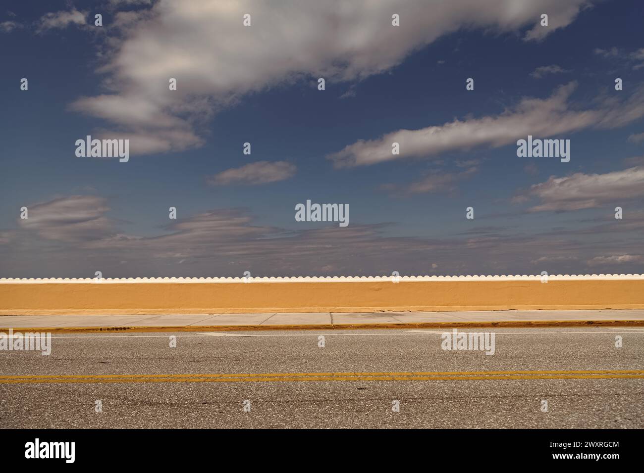 asphalt road with line marking and cloudy sky Stock Photo - Alamy
