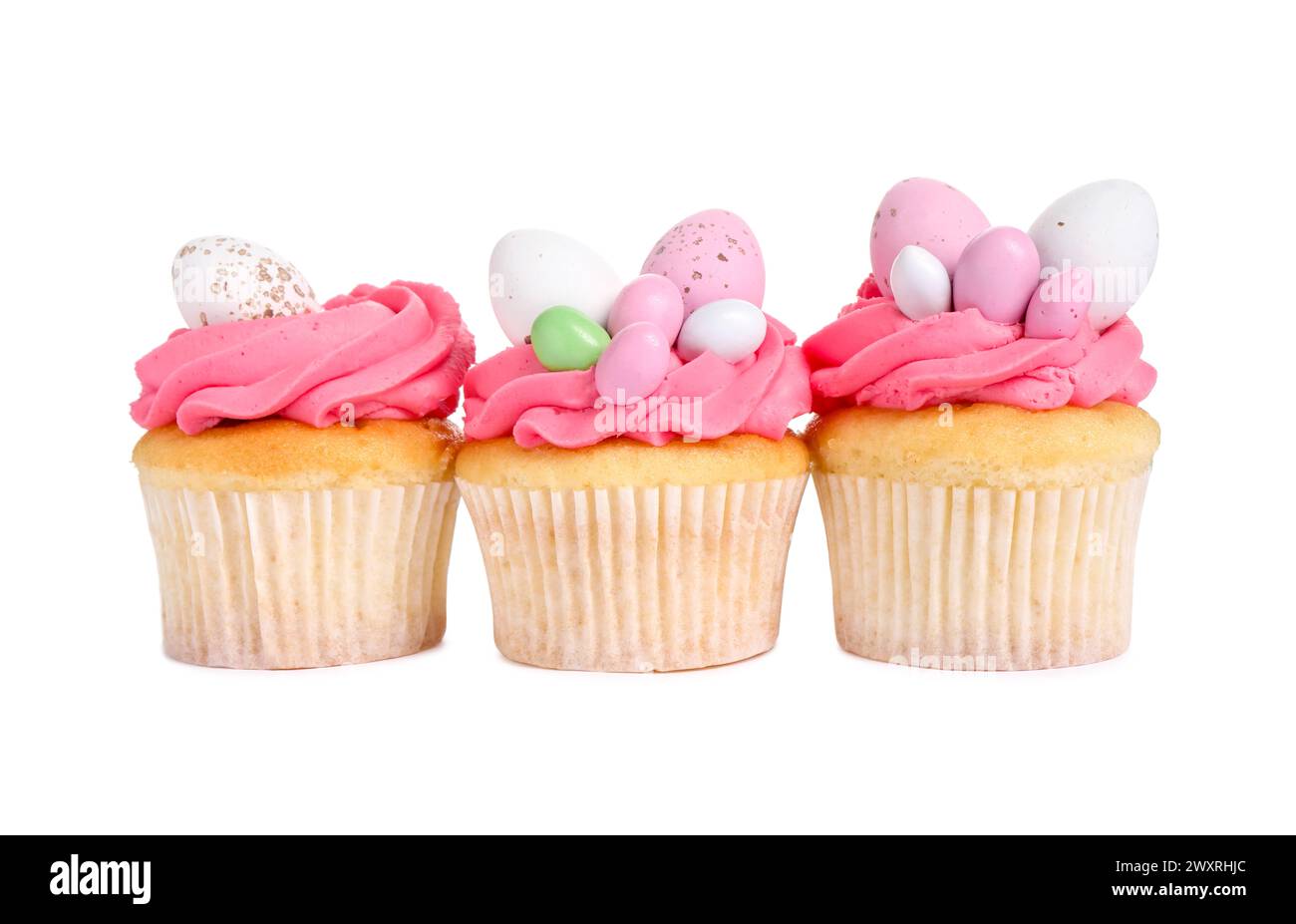 Tasty decorated Easter cupcakes isolated on white Stock Photo