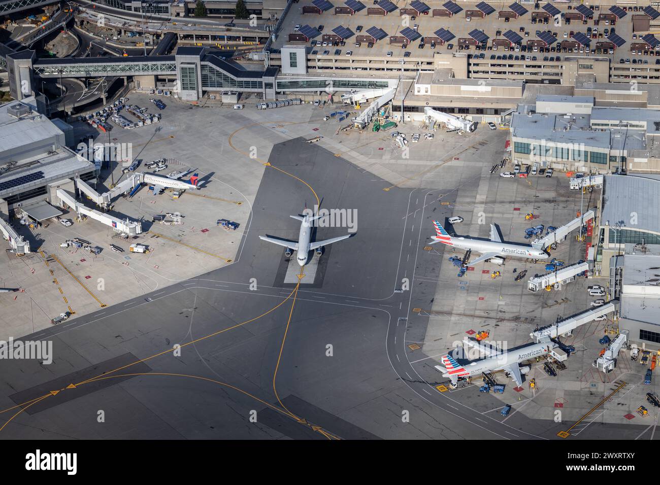 An aerial view of an aircraft parked at an airport Stock Photo - Alamy
