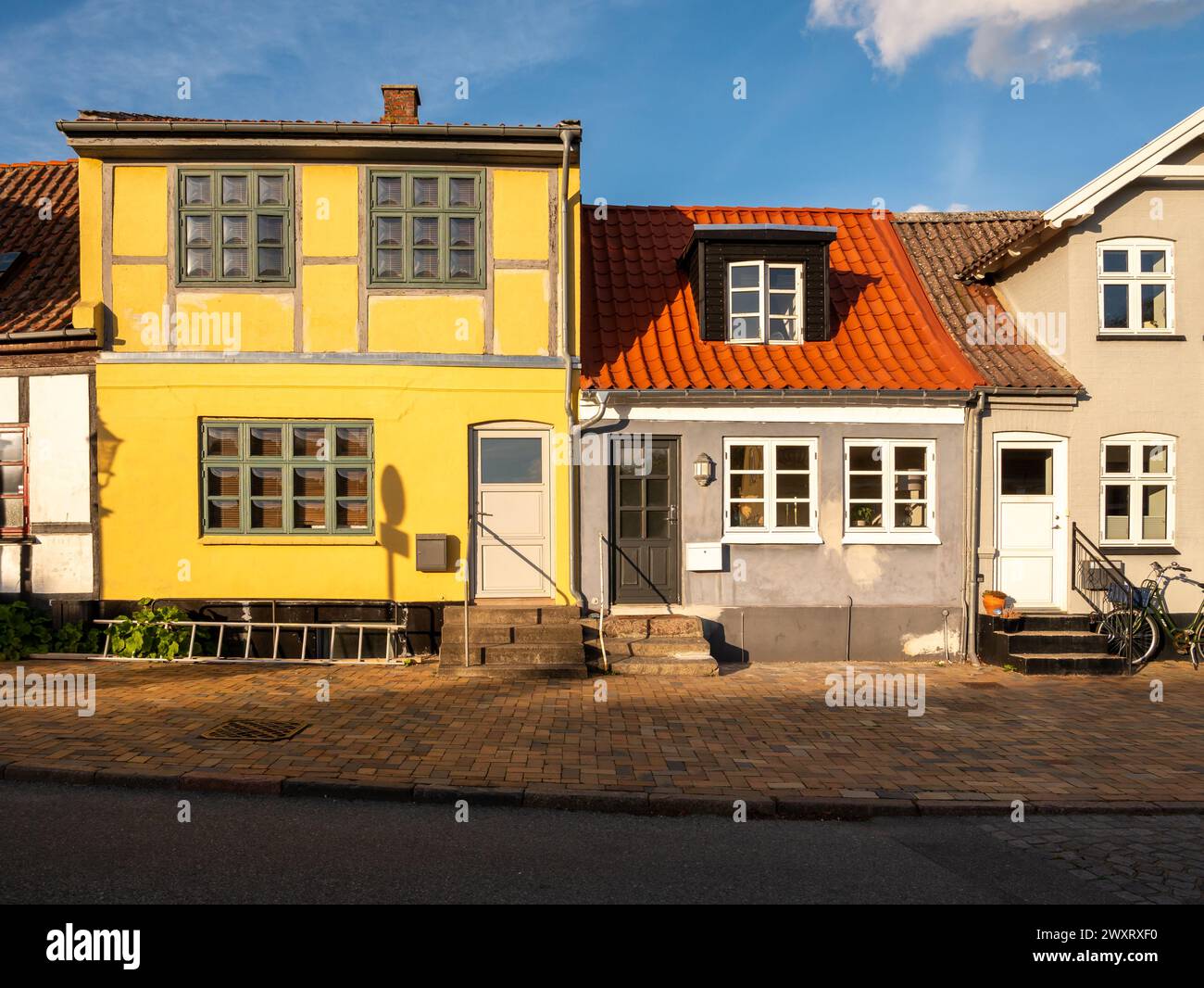 Charming historic houses along Adelgade in old town of Bogense, Funen, Denmark Stock Photo