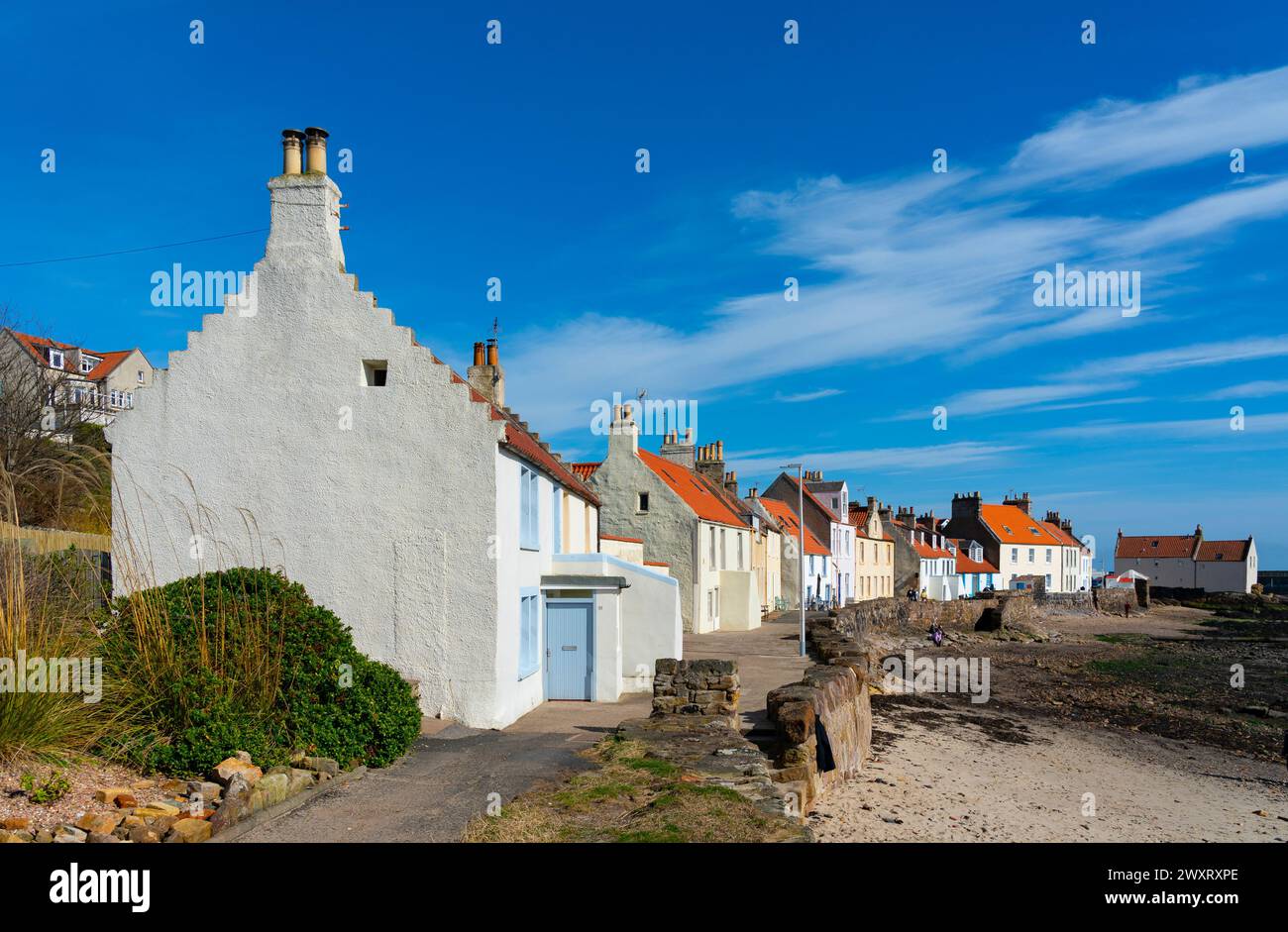 View of old houses and narrow Mid Shore street in Pittenweem, East Neuk of Fife, Scotland, UK Stock Photo