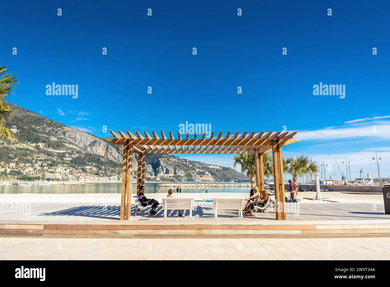 Menton, France - March 02, 2019: day view of Plage des Sablettes in Menton. It is located between the two ports along the Quai Bonaparte and the old t Stock Photo
