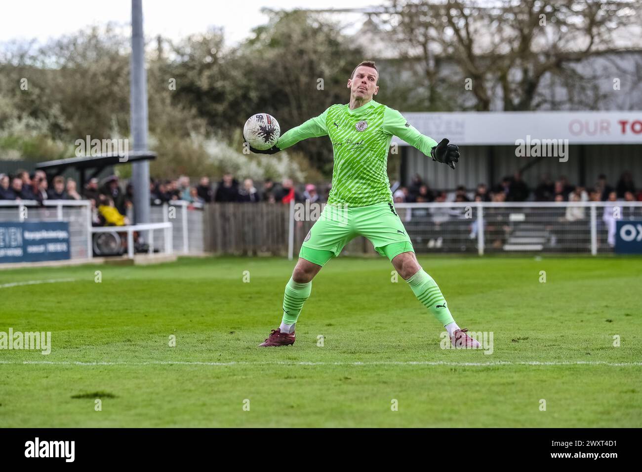 Brackley Town Football Club goalkeeper Danny Lewis against Tamworth in the Vanarama National League North on Monday 1st April 2024. Stock Photo