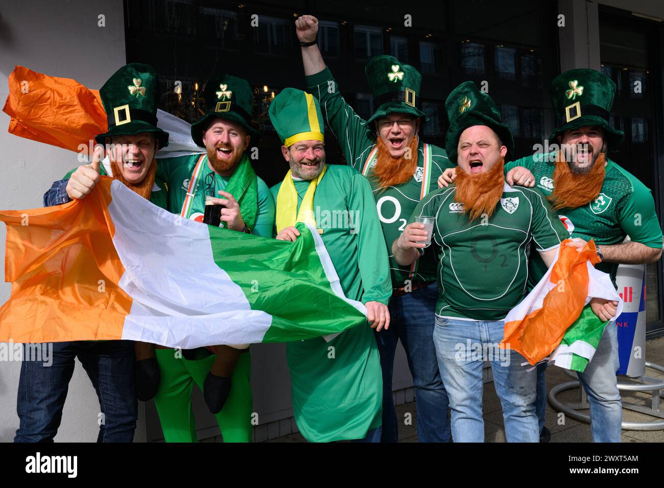 Travelling Irish rugby fans congregate in the pubs around the ground before England take on Ireland in the Six Nations Rugby Championship at Twickenham Stadium in London. Stock Photo