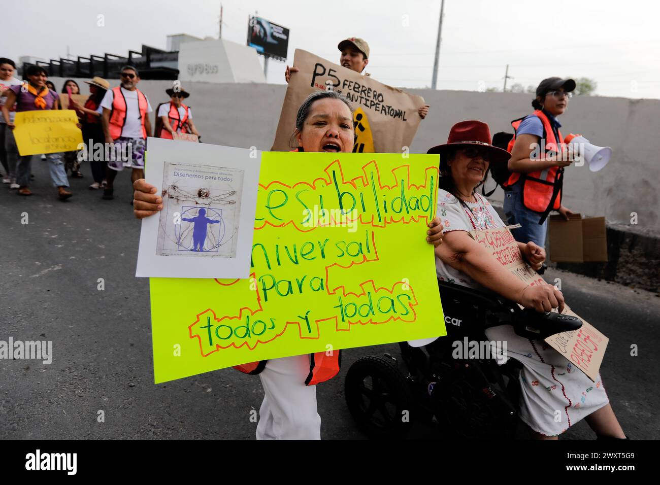 A group of people with different disabilities hold placards during a demonstration. The Union of Cycling Associations of Querétaro, together with representatives of various groups of people with disabilities, pedestrians and public transport users, held a demonstration on Paseo 5 de Febrero, to demand, through a human cycle path, a walk and a ride, that Consider in the mega project (which has not yet completed its construction and in which more than 6 billion pesos were invested) the conditions for sustainable mobility and that only car users are not prioritized. (Photo by Cesar Gomez/SOPA I Stock Photo