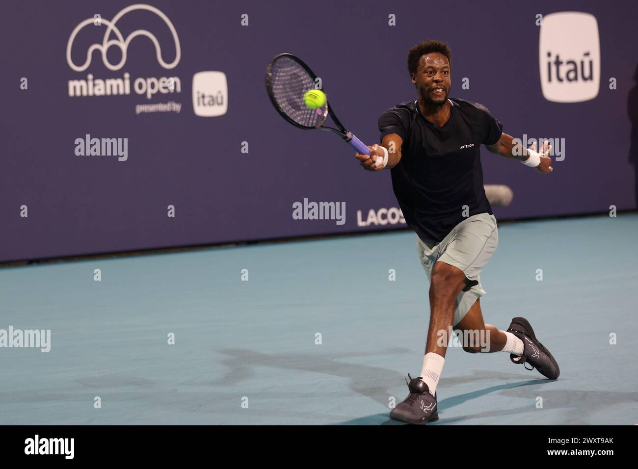 Gael Monfils returns the ball at the Miami Open on March 23, 2024 in Miami Gardens, FL.   Gael Monfils defeated Jordan Thompson 6-7, 6-1, 6-2 in the second round. (Credit: Paul Fong/Image of Sport) Stock Photo