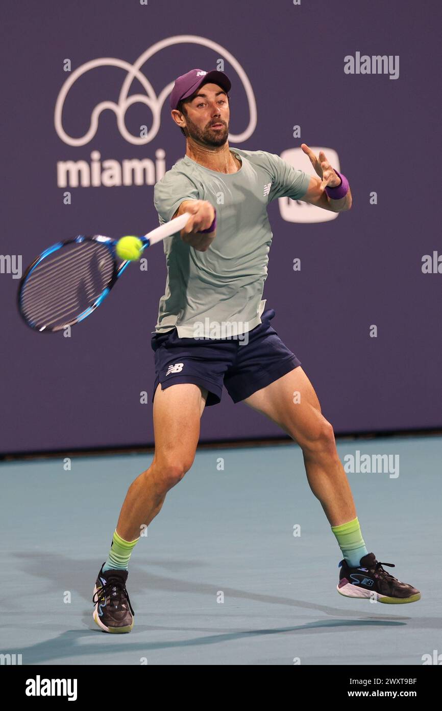 Jordan Thompson returns the ball at the Miami Open on March 23, 2024 in Miami Gardens, FL.   Gael Monfils defeated Jordan Thompson 6-7, 6-1, 6-2 in the second round. (Credit: Paul Fong/Image of Sport) Stock Photo