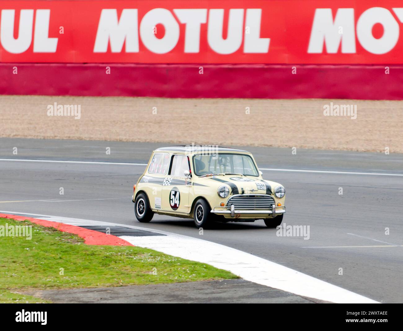 Billy and Carl Nairn's Yellow and Black, 1965, Morris Mini Cooper S, during the Adrian Flux Trophy for Transatlantic Pre'66 Touring Cars Race Stock Photo