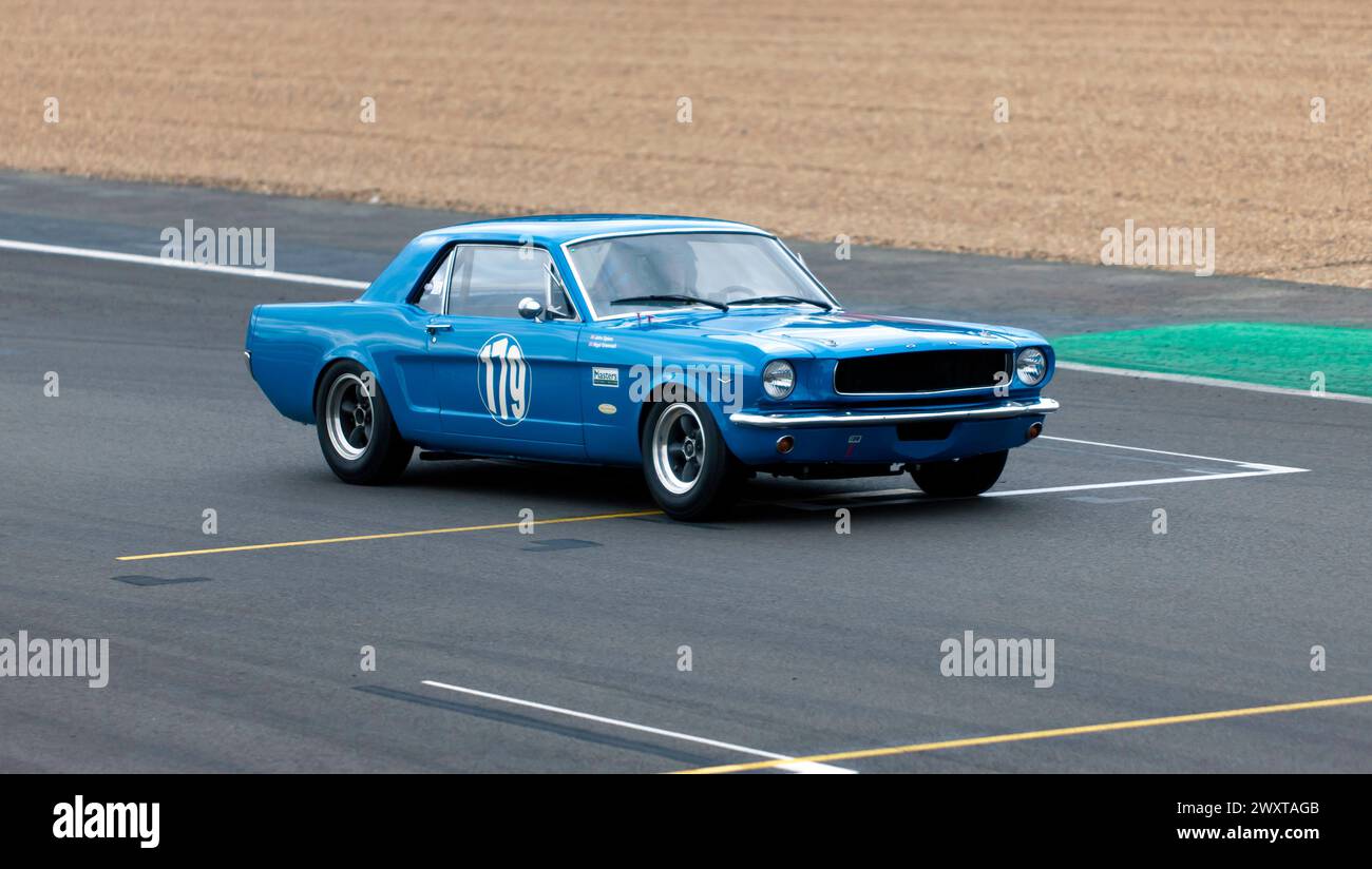 John Spiers and Nigel Greensall's Blue, 1965, Ford Mustang, during the Adrian Flux Trophy for Transatlantic Pre'66 Touring Cars. Stock Photo