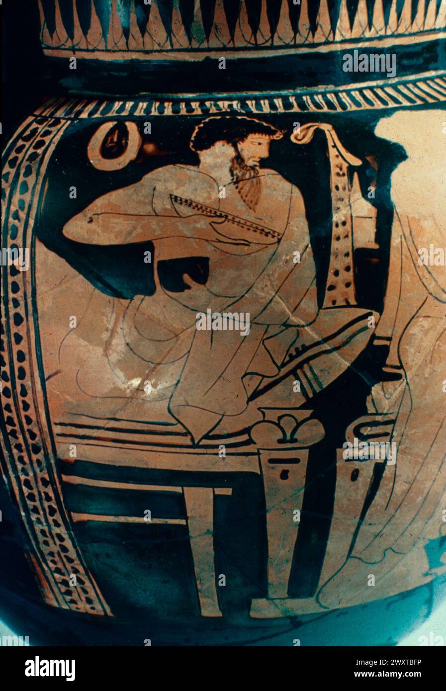 Man sitting at a banquet, painting on ancient Greek vase, Greece 400 BC Stock Photo