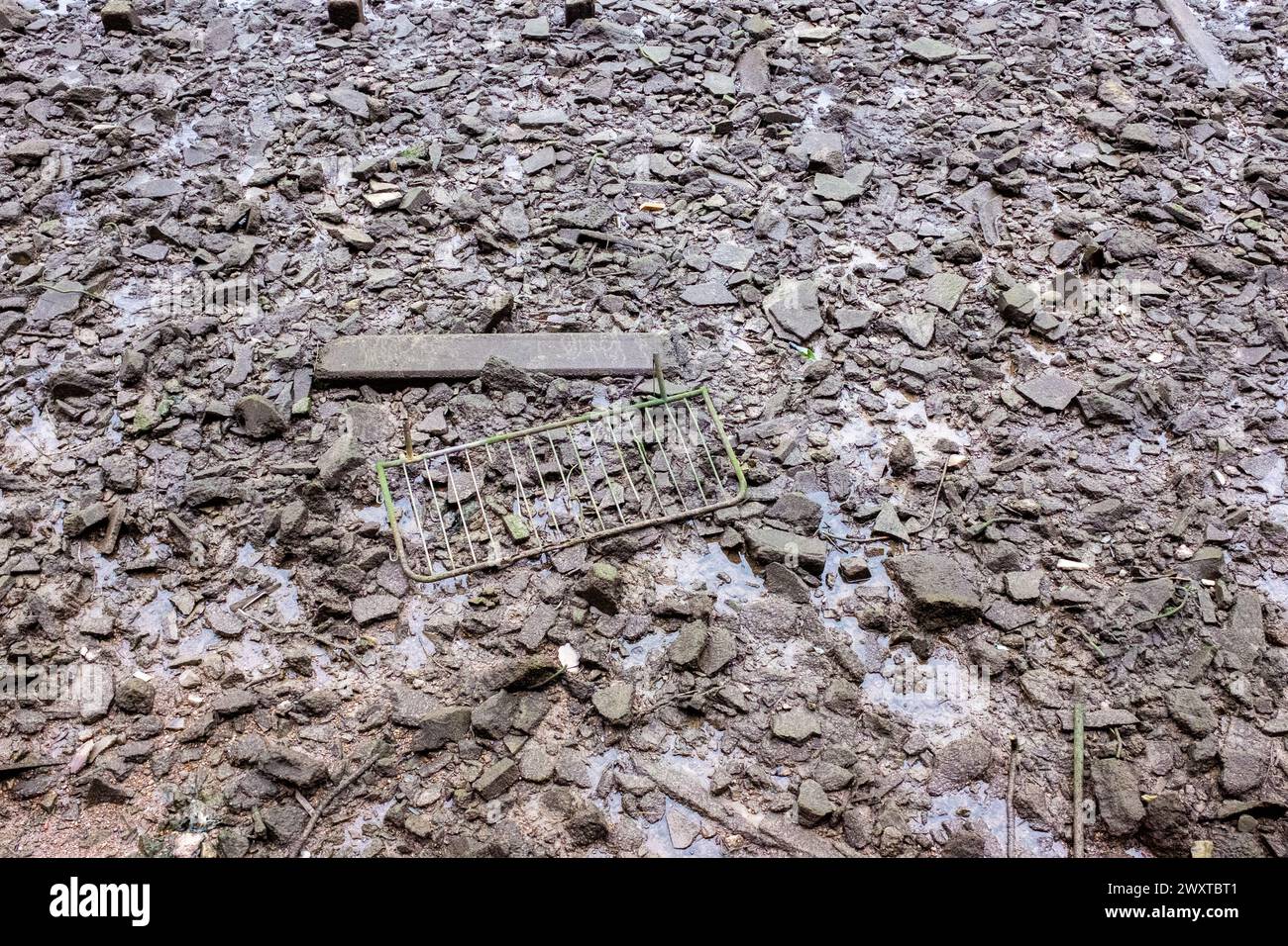 Ugly Rivers Ugly, polluting mad made debris by the shoreline of the River Thames in ...