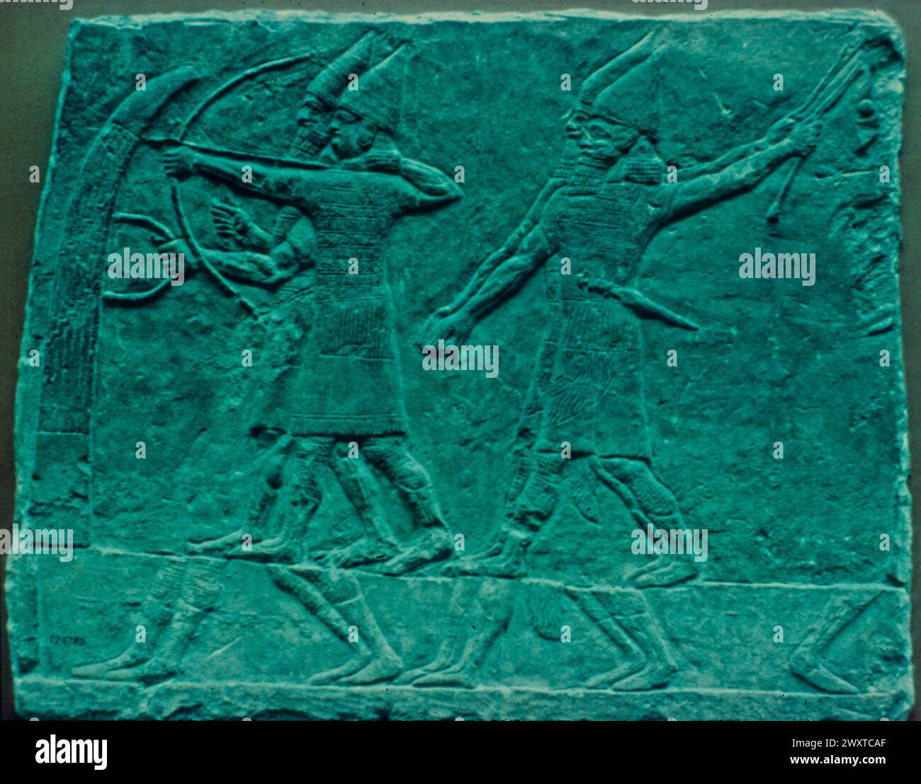 Assyrian archers and slingers in battle, bas-relief, Sennacherib's Palace, Nineveh, Mesopotamia Stock Photo