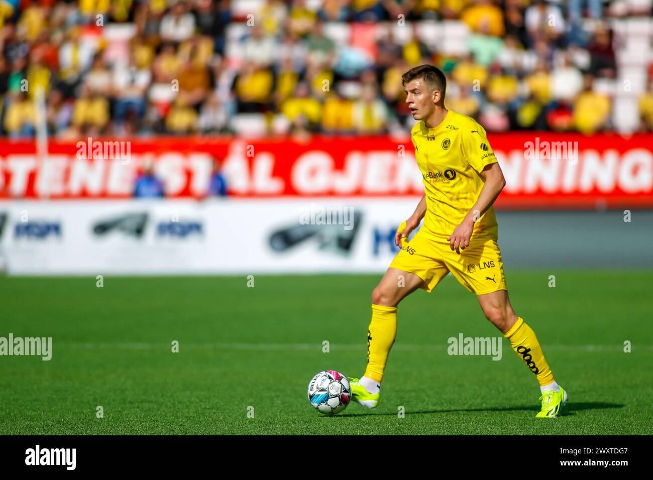 Fredrikstad, Norway, 1st April 2024.  Bodø/Glimt's Jostein Gundersen on the ball in the Eliteserien match between Fredrikstad and Bodø/Glimt at Fredrikstad stadium.  Credit: Frode Arnesen/Alamy Live News Stock Photo