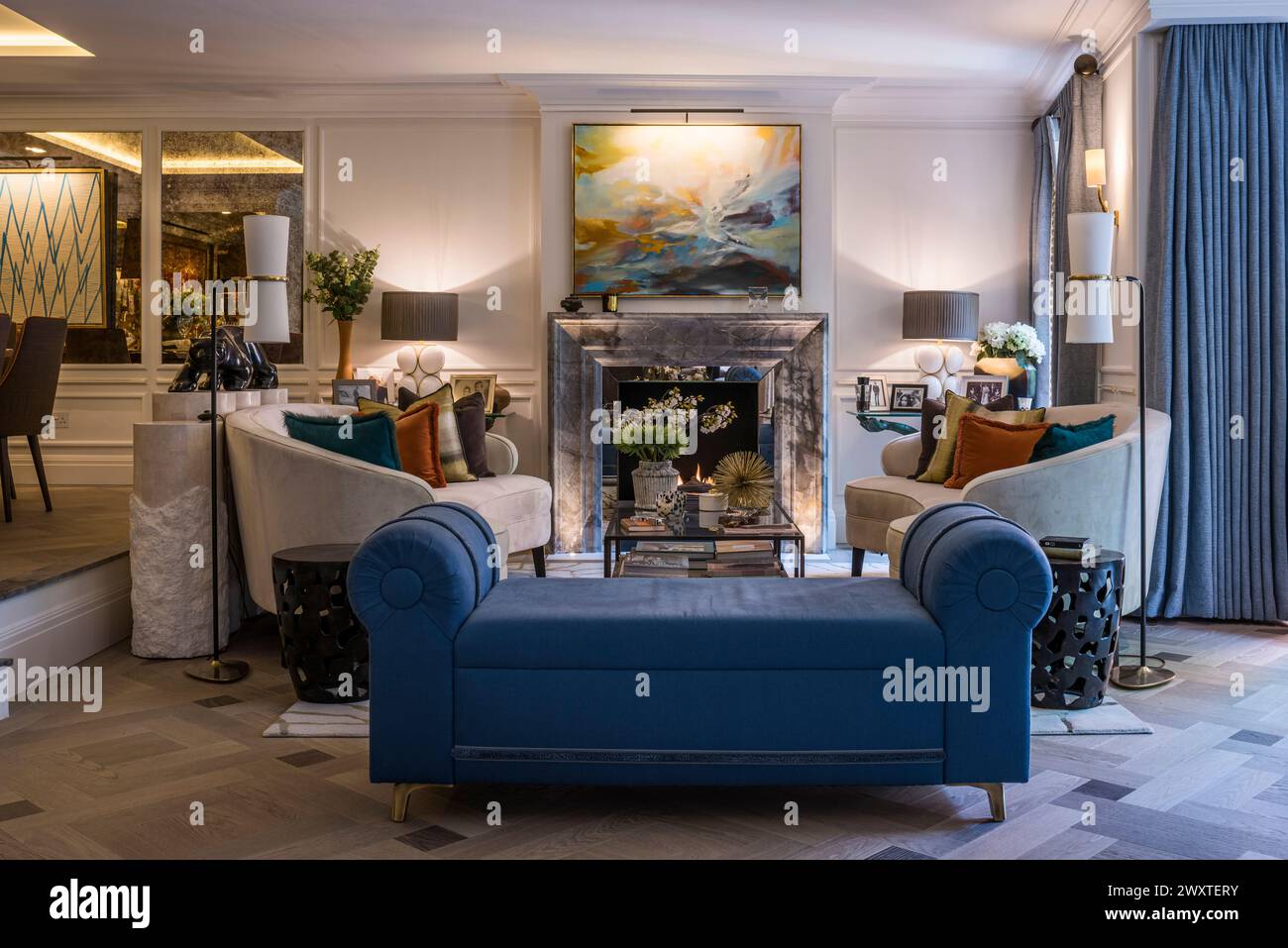Blue crouch and seating area in Chelsea townhouse, West London, UK Stock Photo