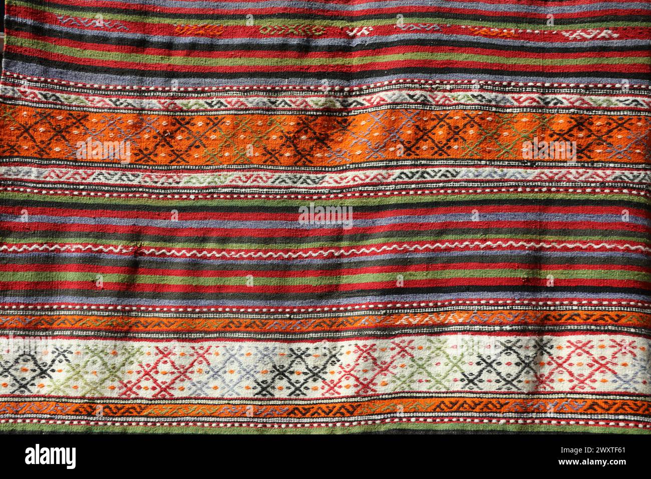 Textures and patterns in color from woven carpets. Stock Photo