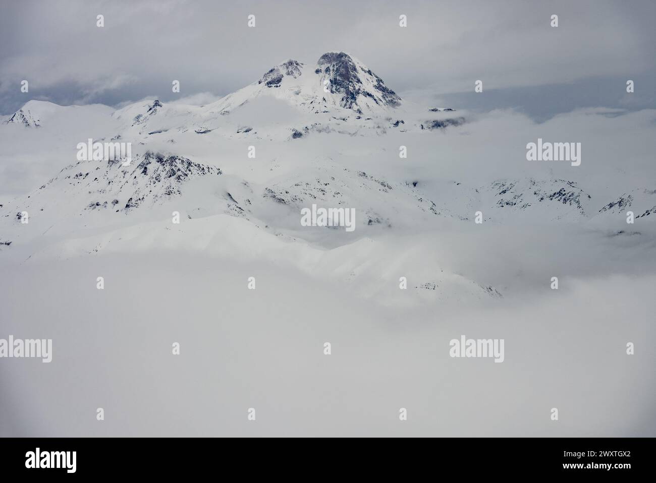 Kudebi, Bidara, Sadzele, Kobi aerial panorama in caucasus winter mountains. Aerial drone view of Gudauri ski resort in winter. Caucasus mountains in G Stock Photo
