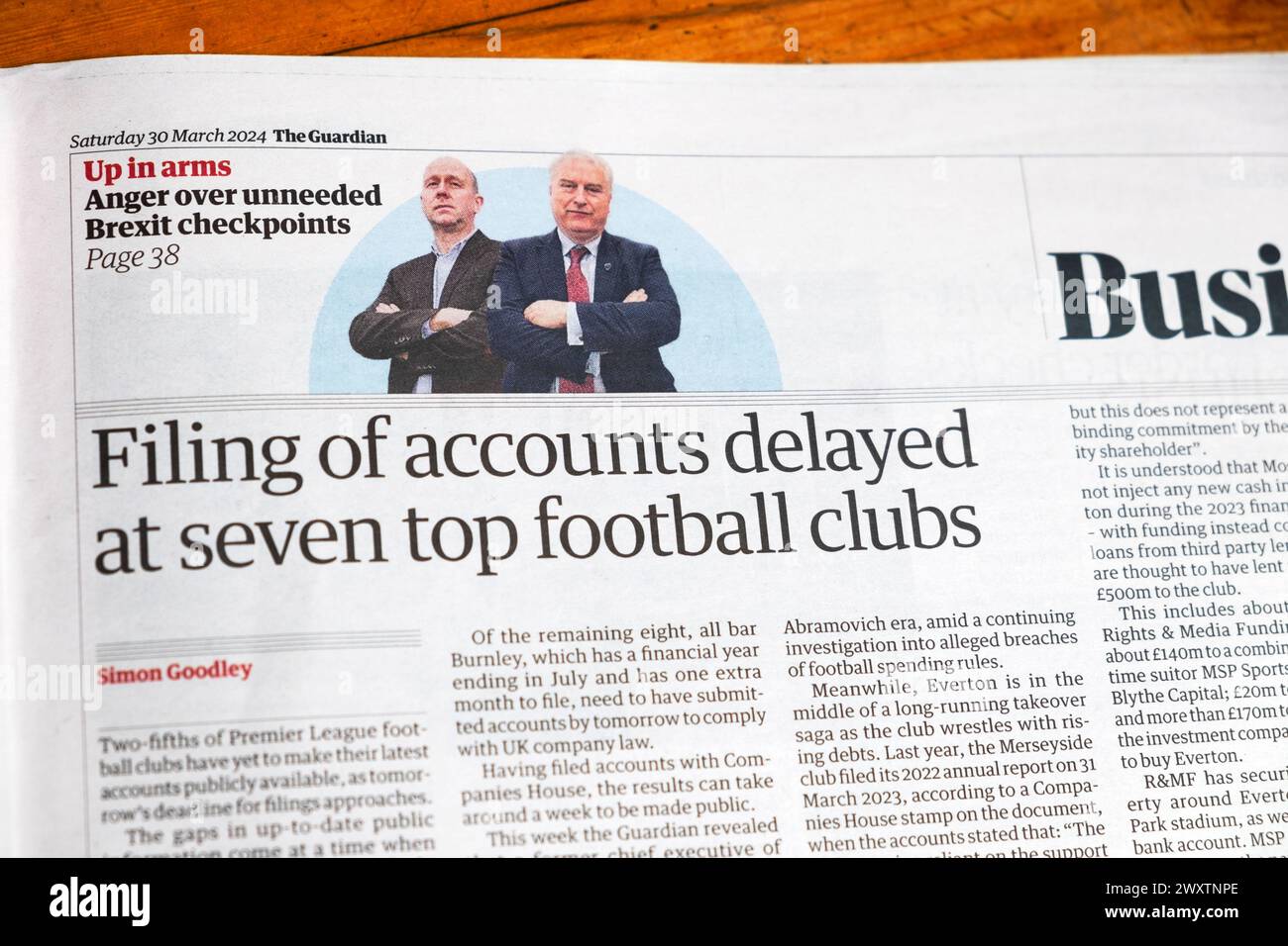 'Filing of accounts delayed at seven top football clubs' Guardian newspaper headline Premier League financial article 30 March 2024 London UK Stock Photo
