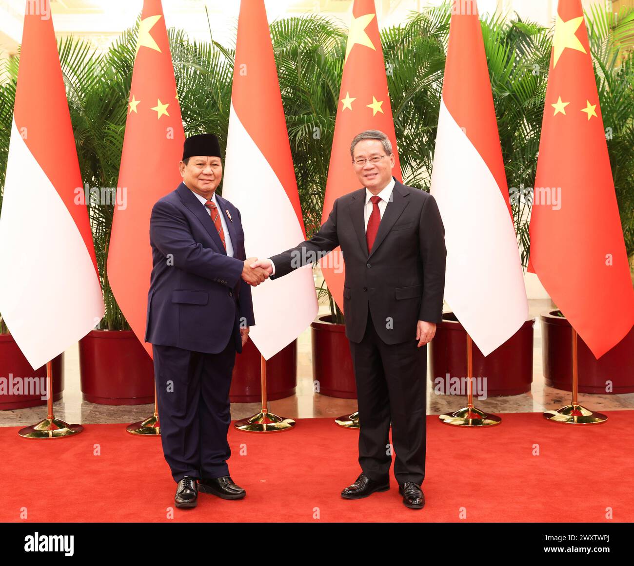 Beijing, China. 2nd Apr, 2024. Chinese Premier Li Qiang meets with the President-elect of the Republic of Indonesia Prabowo Subianto at the Great Hall of the People in Beijing, capital of China, April 2, 2024. Credit: Pang Xinglei/Xinhua/Alamy Live News Stock Photo