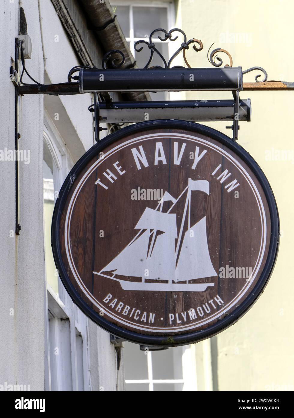 Traditional hanging pub sign at The Navy Inn - public house - Southside Street, Barbican, Plymouth, Devon, England, UK Stock Photo