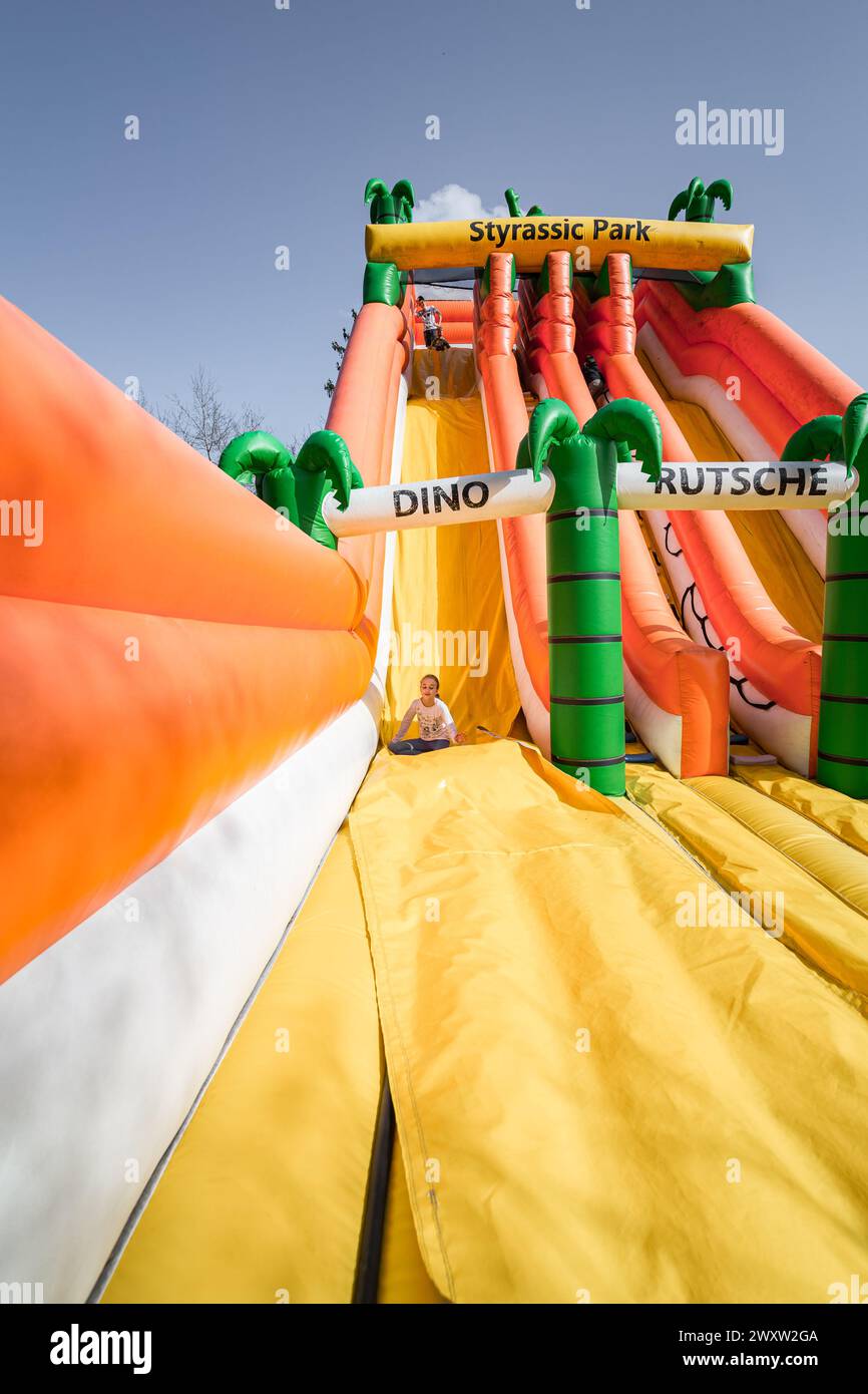 Bad Gleichenberg, Austria - March 30th 2024 - A girl on an inflatable ...