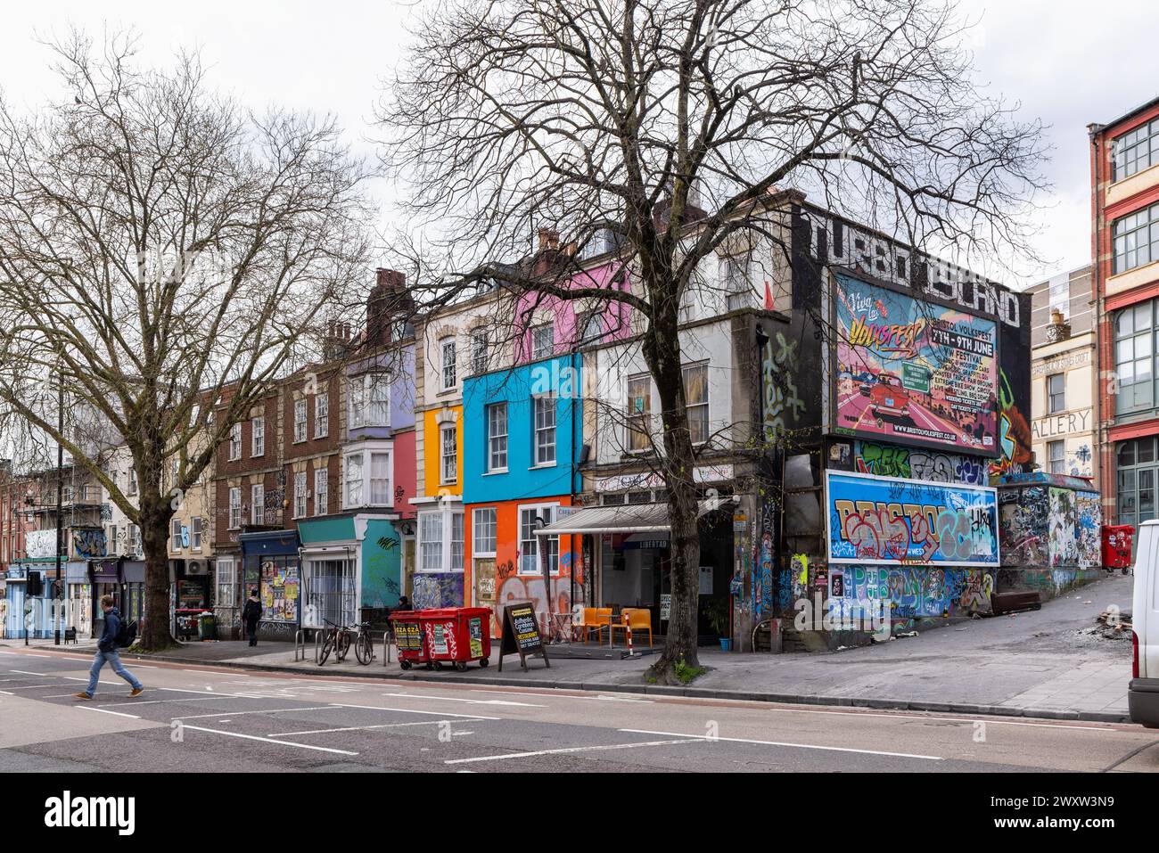 Bright colourful paint houses street scene  - Contemporary Street Art in Stokes Croft, Bristol, England, UK Stock Photo